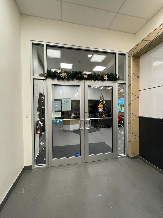 Garland with gold stars above an entrance door